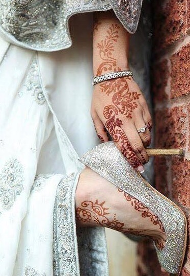 Henna Tattoos an Fuß und an der Hand